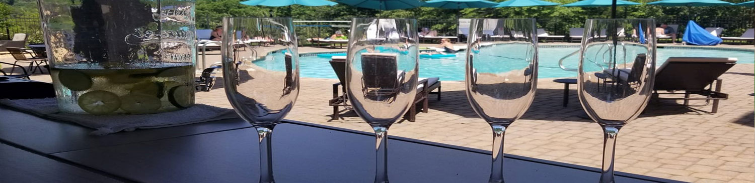 pool with 4 champagne glasses