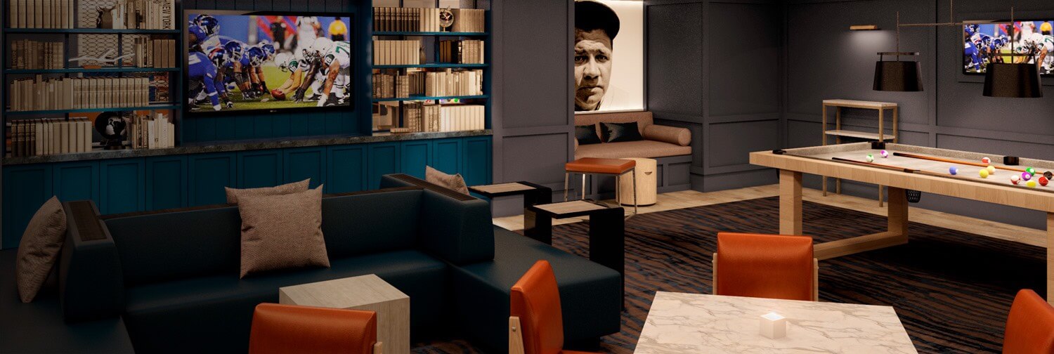 Seating area with couches next to billiard table