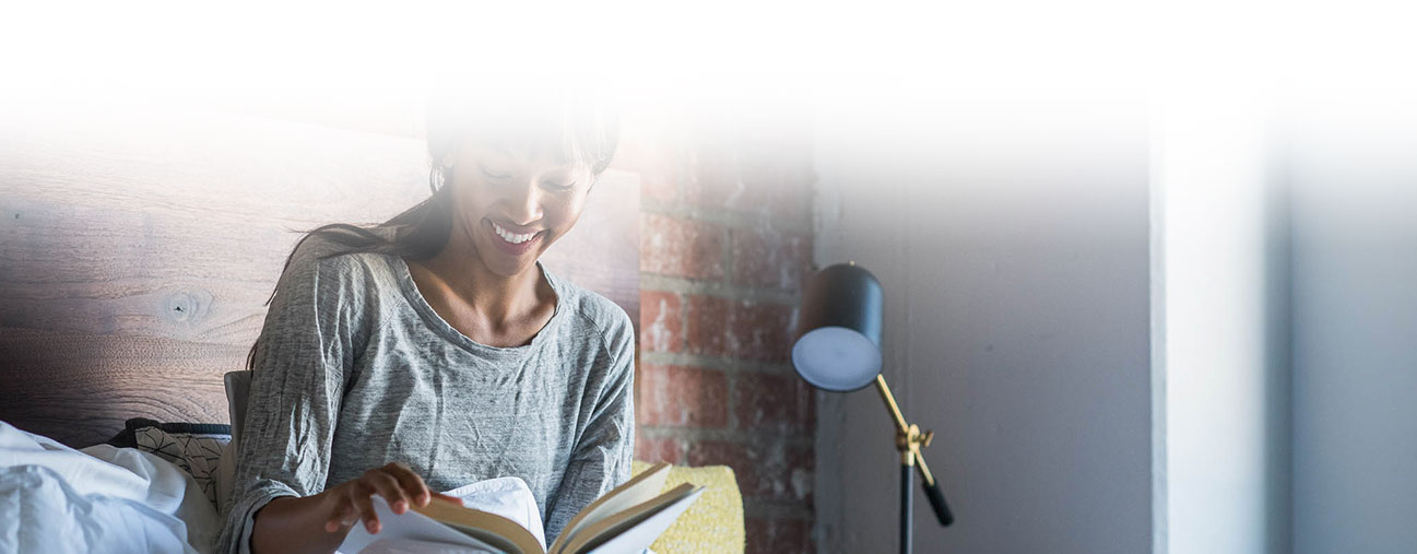 woman reading a book header