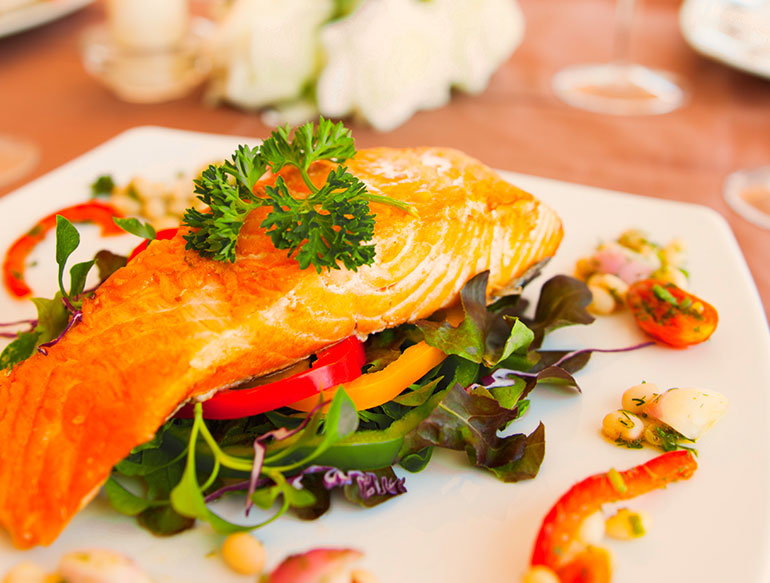 delicious salmon served over fresh vegetables at the great white