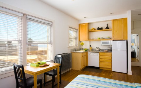 open kitchenette with two person dining area 