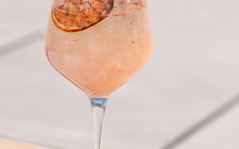 pink drink  in a wine stem Vistal cocktail