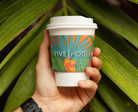 hand holding a vive coffee cup