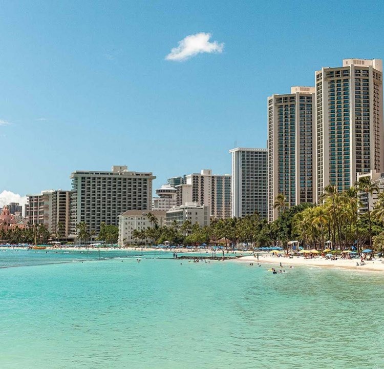 the beach with hotels along the sand