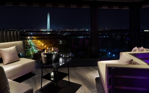 lounge area in restaurant along with view of washington dc