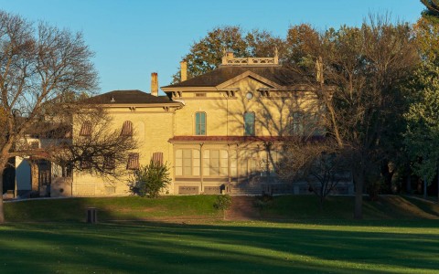Exterior view of the property and big trees around it