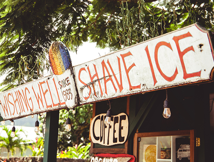 wishing well shave ice sign with a coffee sign below