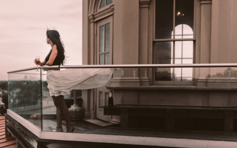 Lady on the rooftop of Wentworth Mansion