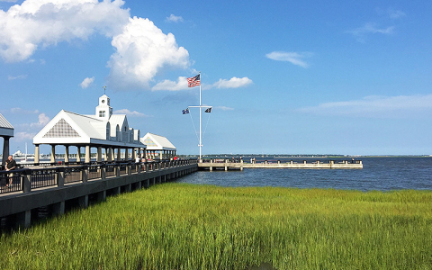 Dock with American flag overlooking lake