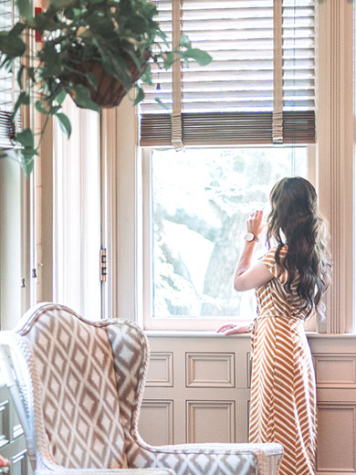 Woman looking at the window