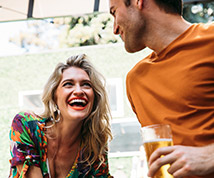 man and woman laughing