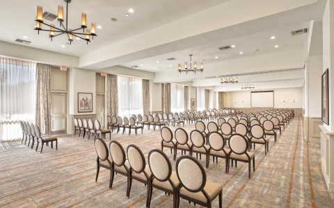 rear view of a meeting ballroom with rows of chairs
