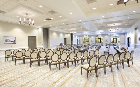 side view of a meeting ballroom with rows of chairs