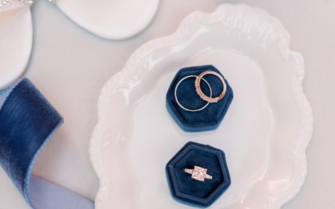Jewellery, dress shoes and a gold cup