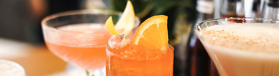 orange fizzy drinks with orange slices