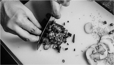 chef cutting ingredients