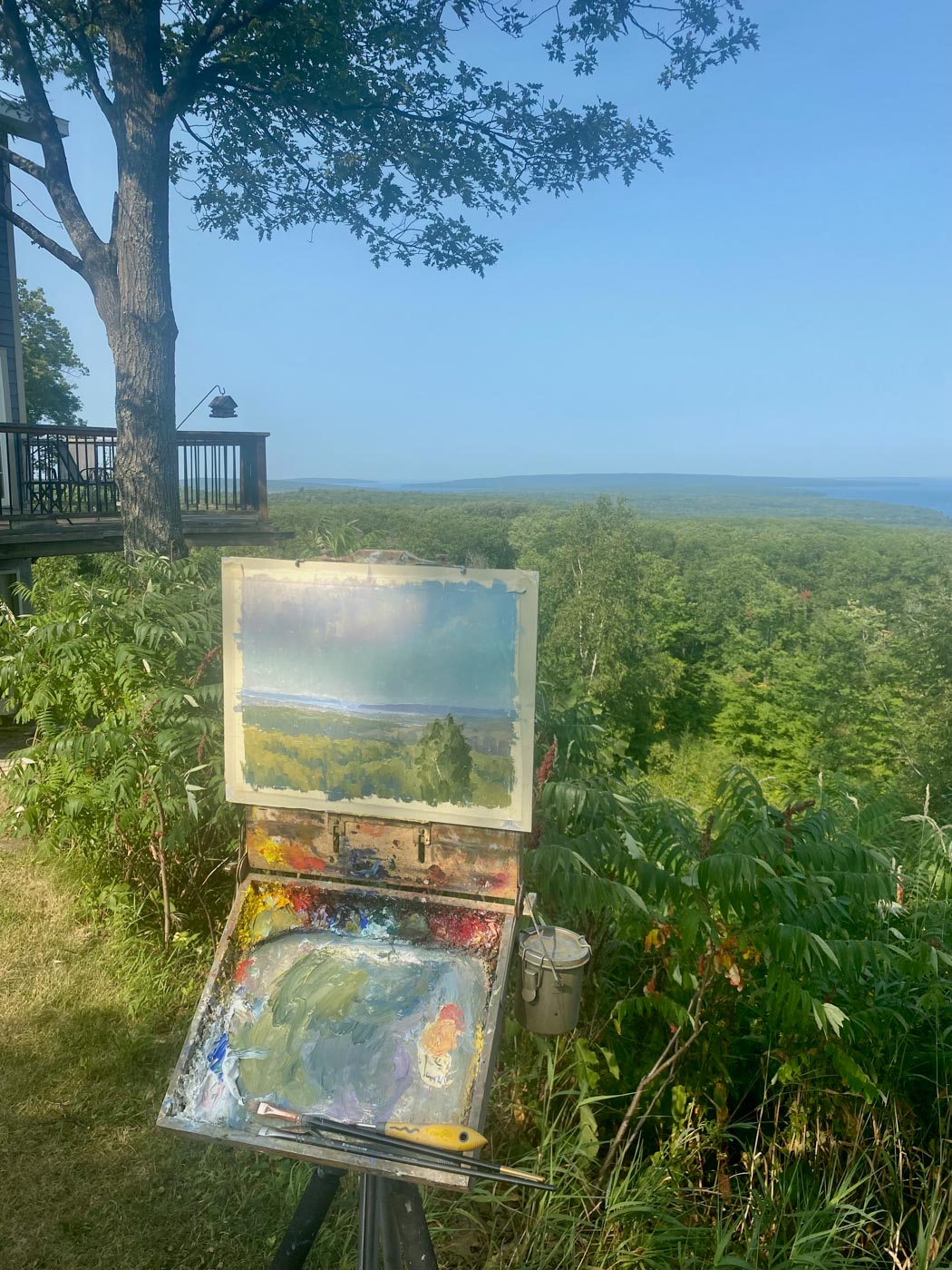 View of a painting and some painting materials outdoors