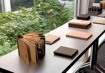 A desk full of notebooks and books