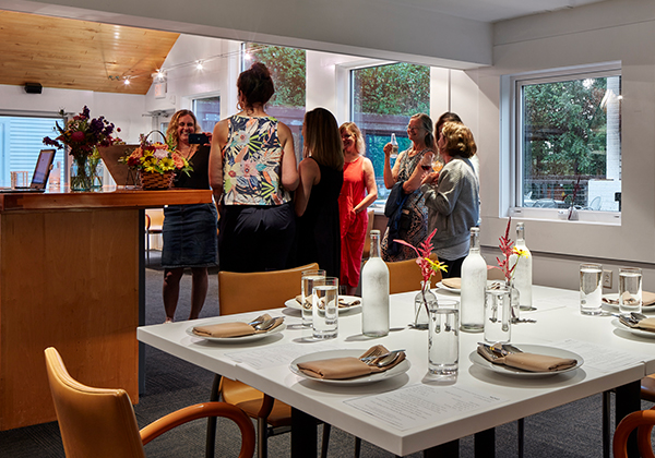 View of a group of women drinking wine inside a dining place