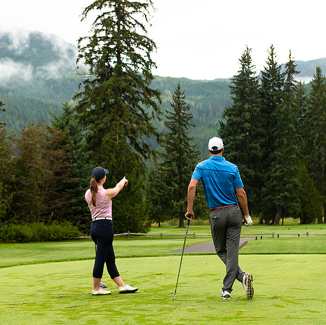 couple playing golf