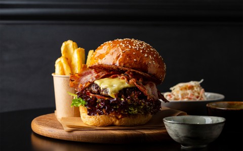 View of a tasty hamburger with fries