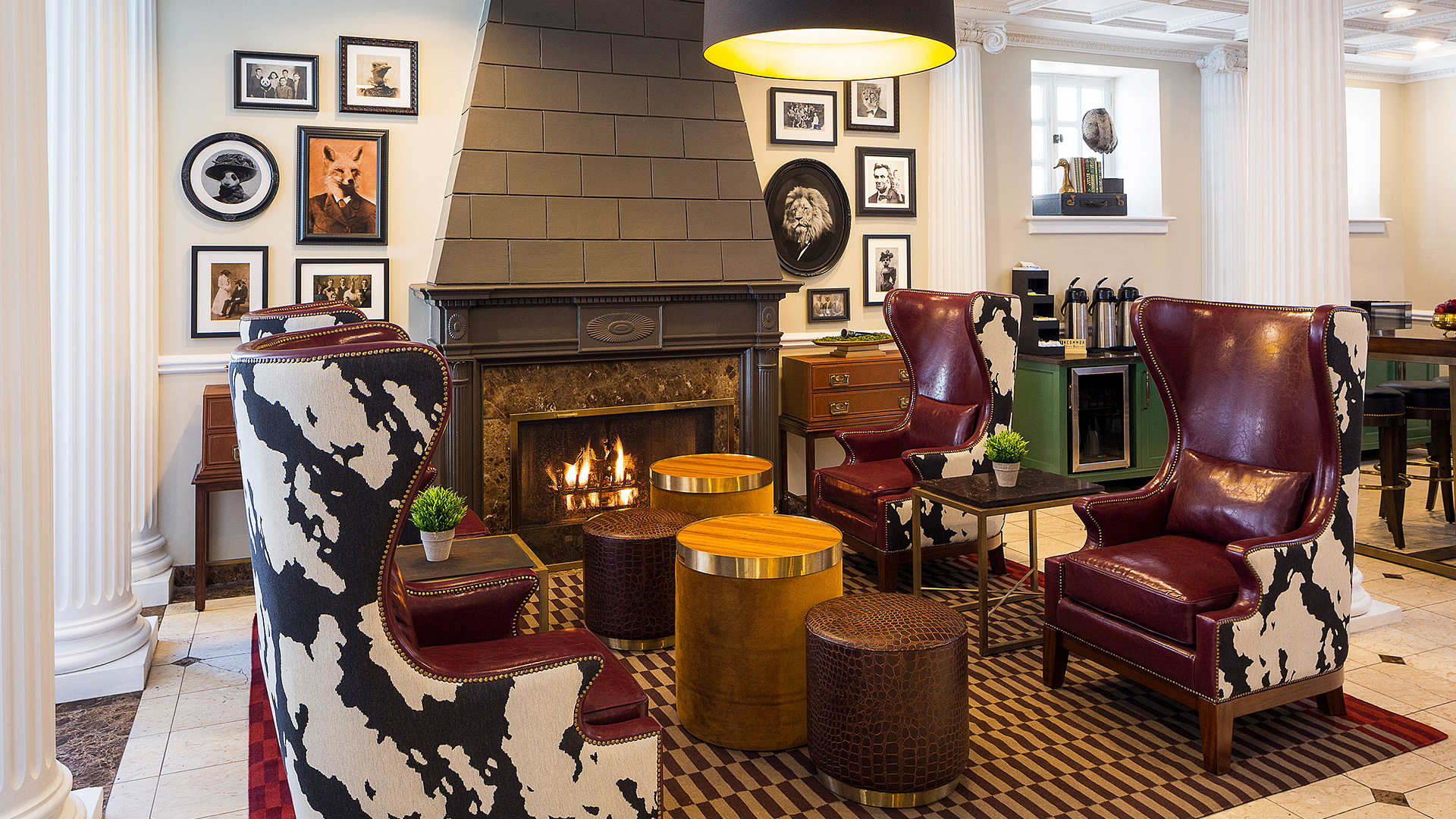 Internal view of a social area with a fireplace and a living room