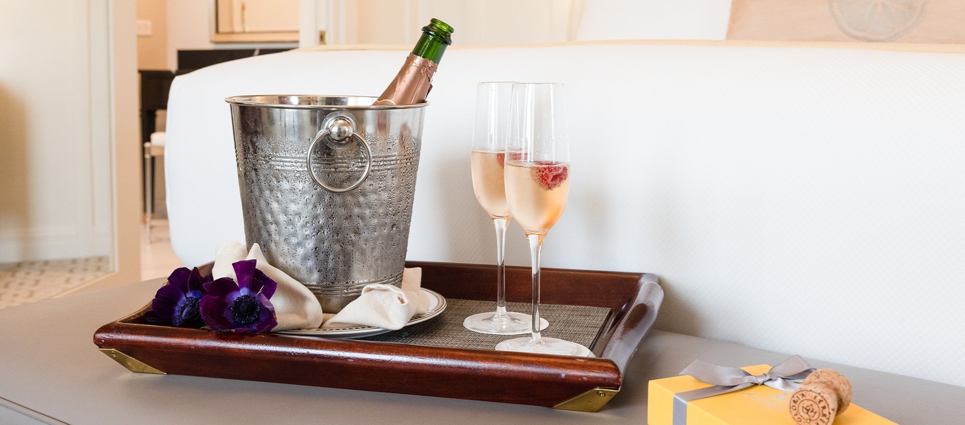 Closeup of a tray with champagne cups inside a room