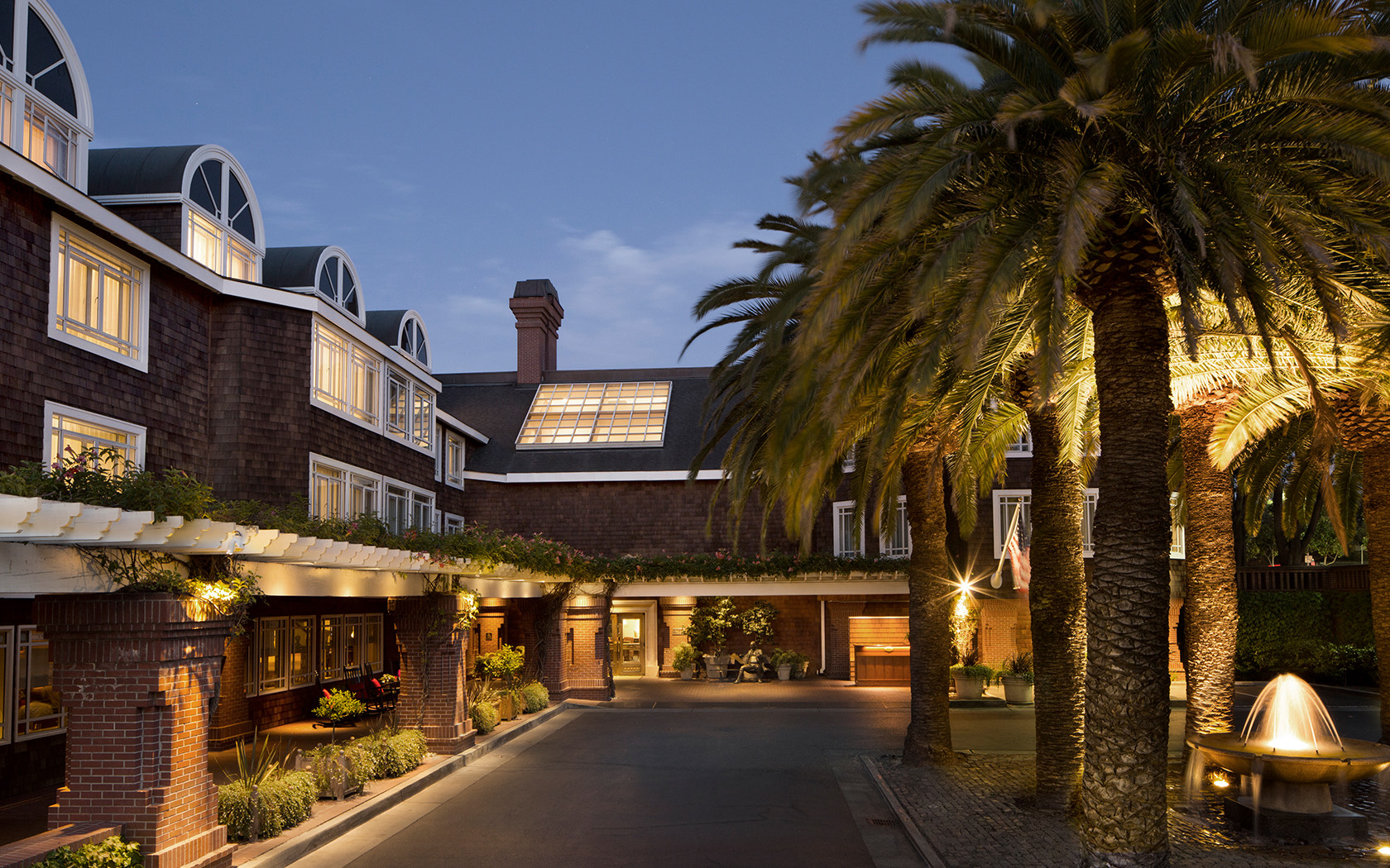 Exterior view of the Stanford Park Hotel at dusk