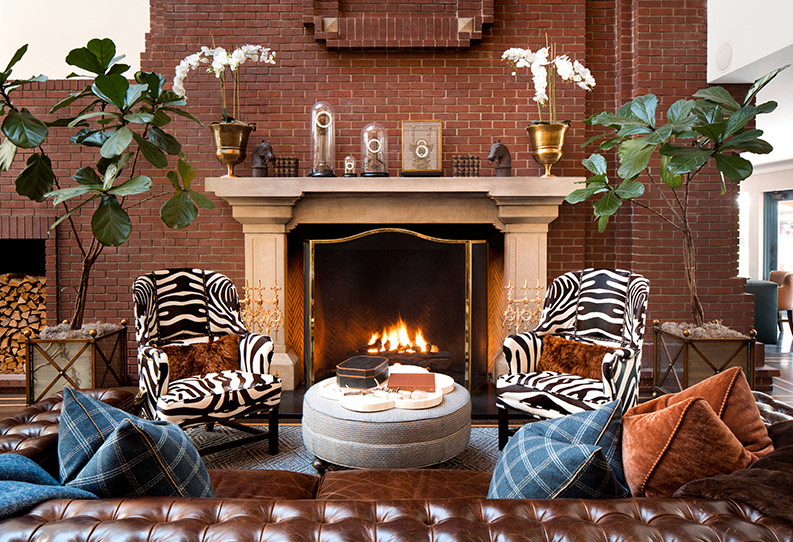 View of a big sophisticated social area with a private fire pit