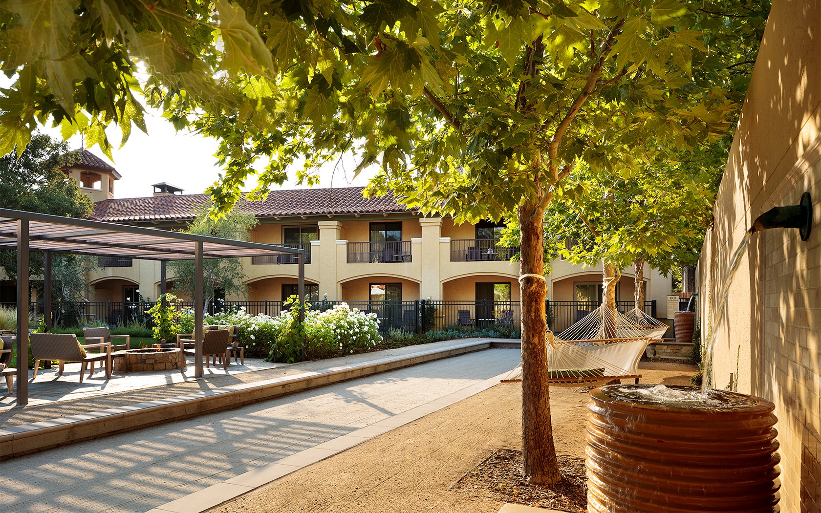 Exterior view of the courtyard surrounded by trees and nature