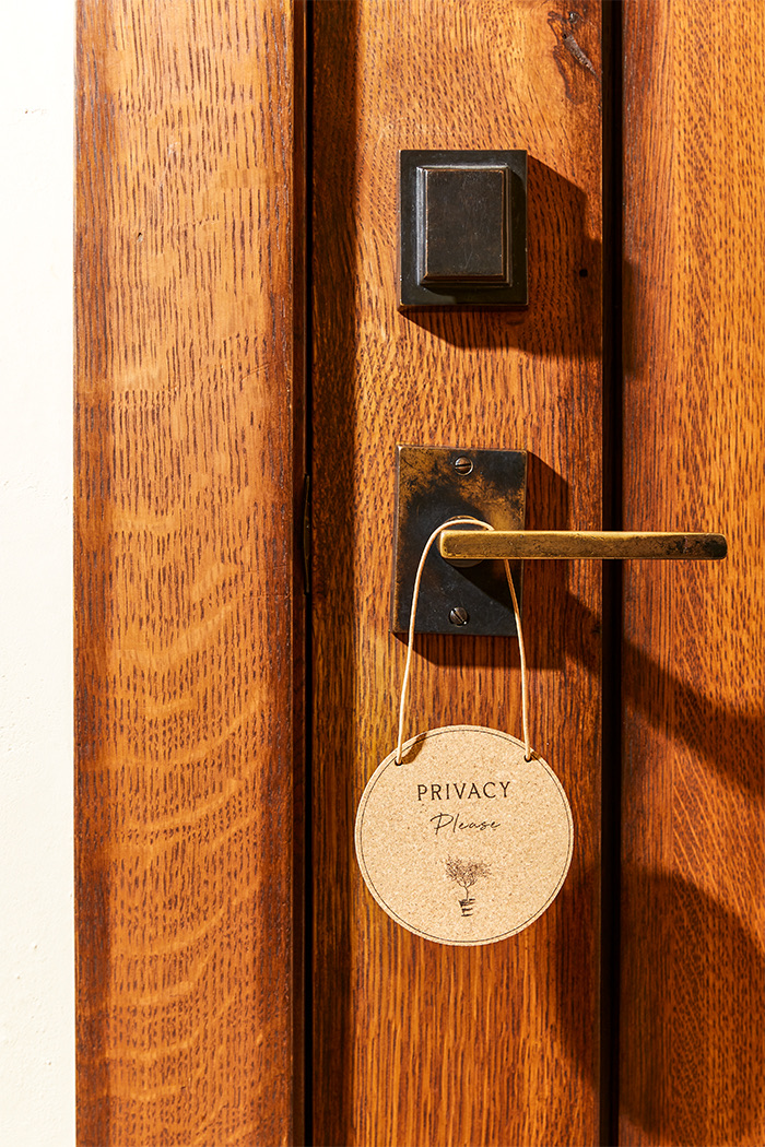 View of a door lock with a Privacy sign