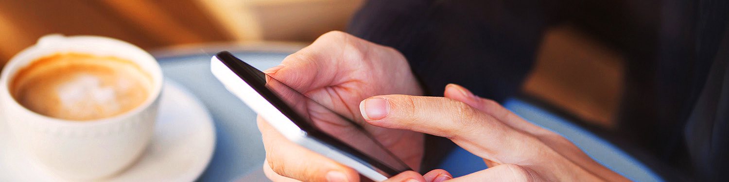 Person typing on their iphone