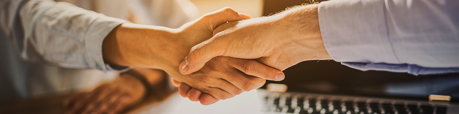 two people shaking hands