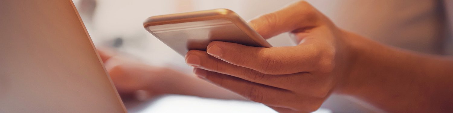 Person using their mobile phone