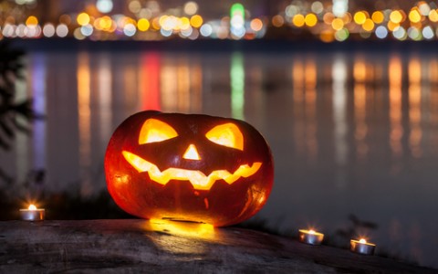 jack o lantern in front of water