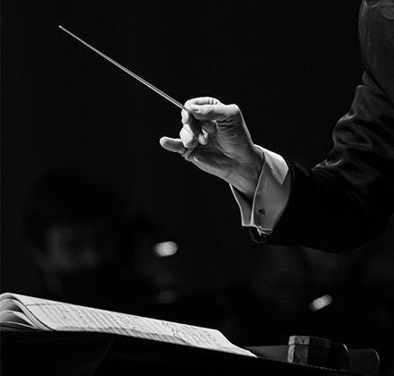 orchestra director in black & white