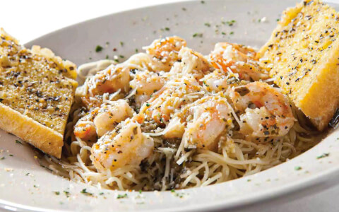 a gourmet dish with pasta and shrimps