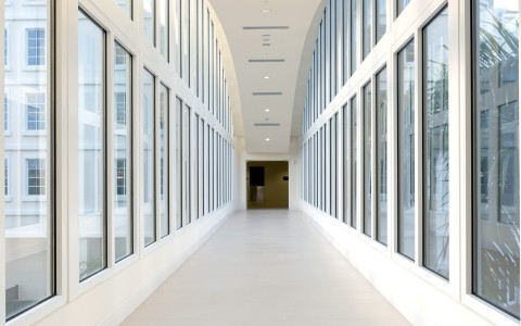 Hallway with glass windows on both sides