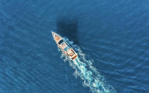 aerial view of boat speeding