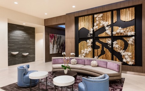 hotel lobby lounge area with half circle sectional couch