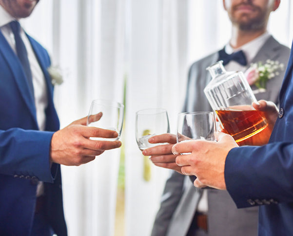 groomsmen making a toast