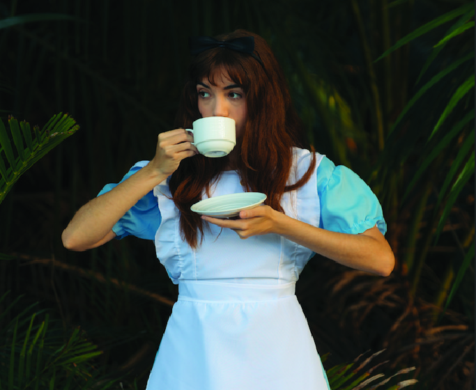 a person holding a cup of coffee