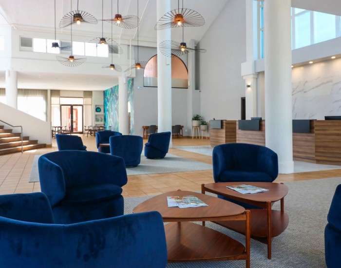 lobby shot with blue chairs