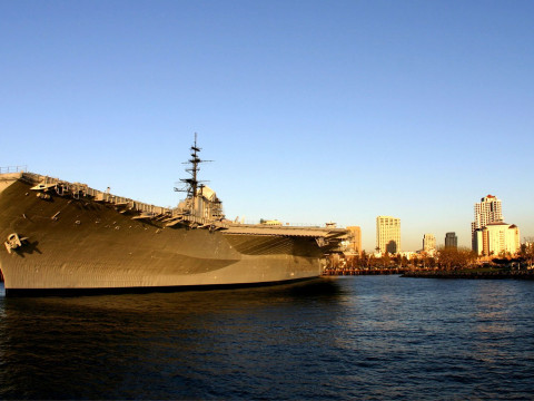 Aircraft carrier docked in San Diego Bay