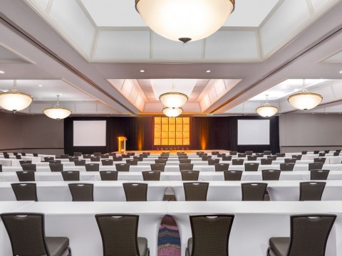 Pacific Ballroom conference space with a large stage and screens