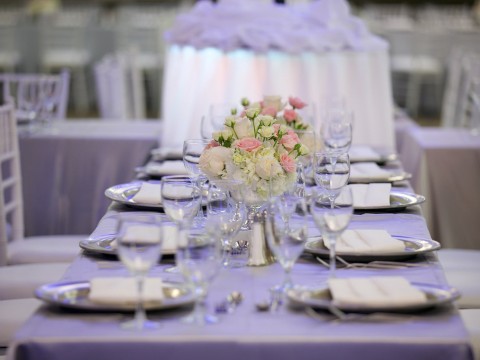 Wedding table setting with white and pink flowers