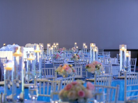 Ballroom decorated with pink and white flowers