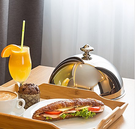 Room Service dining tray with sandwich and drink