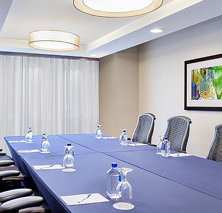 Captains Room setup with tables and chairs for a meeting