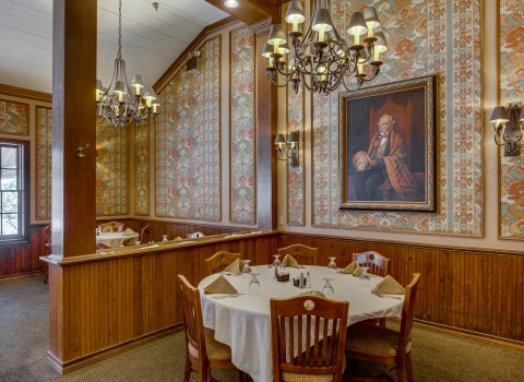 elaborate dining room with Victorian style decor and furnishings